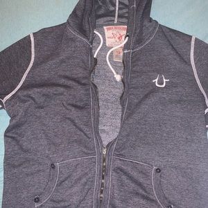 Zip up hoodie with horse shoe